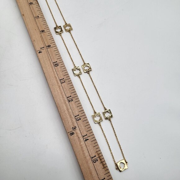Kate Spade New York Hole Punch Cut out Gold Tone Long Necklace - Picture 5 of 12